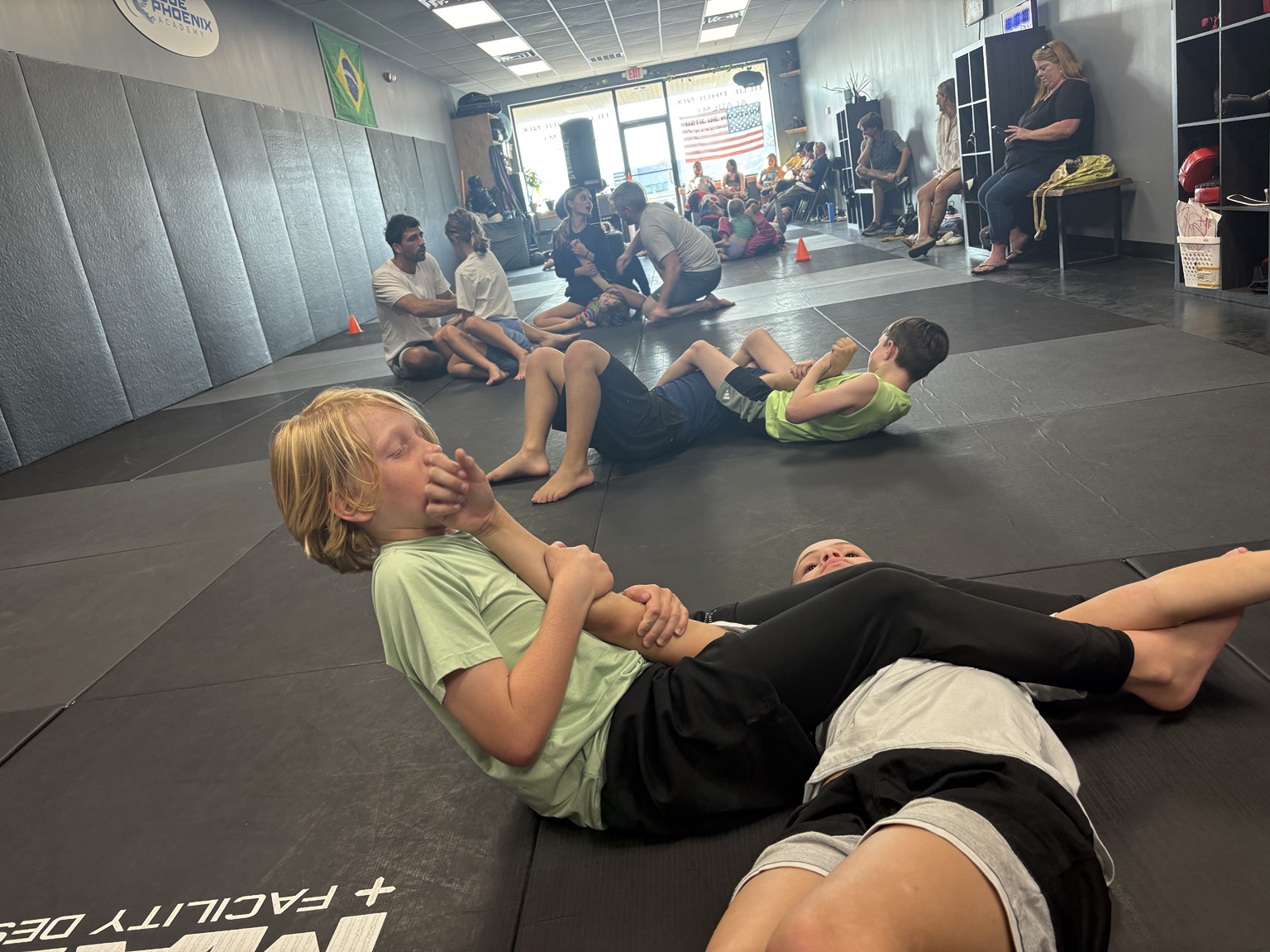 Kids practicing Jiu-Jitsu at Blue Phoenix Academy